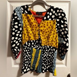 Multicolored blouse with a corset style stretch waist